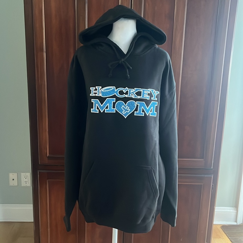 NWT Pennant Hockey Mom Black w/Blue Glitter Graphic Hoodie with Kangaroo Pocket.